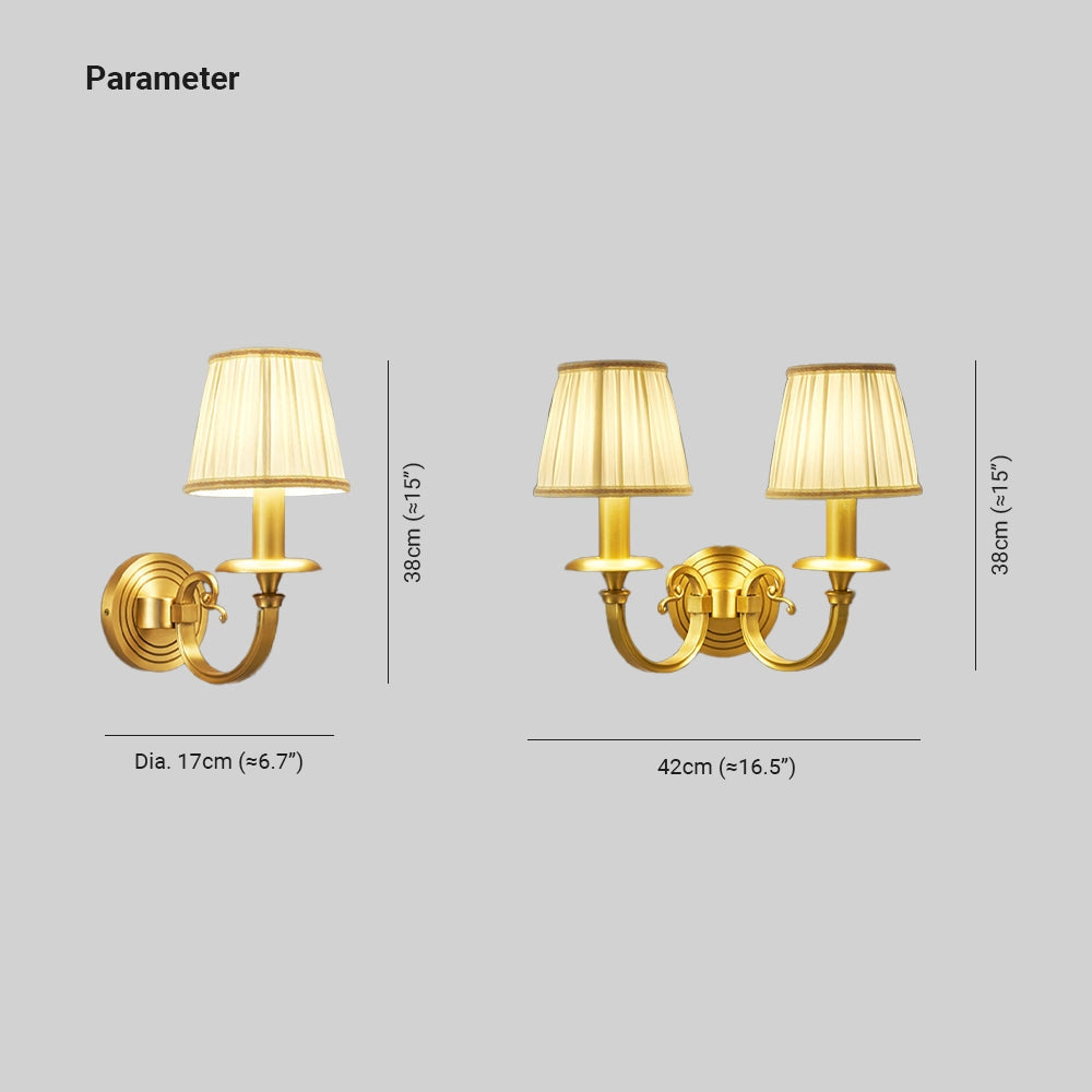 Vintage gold wall sconce in brass with a classic design featuring a metal lampshade, suitable for indoor lighting, mounted on a wooden surface.