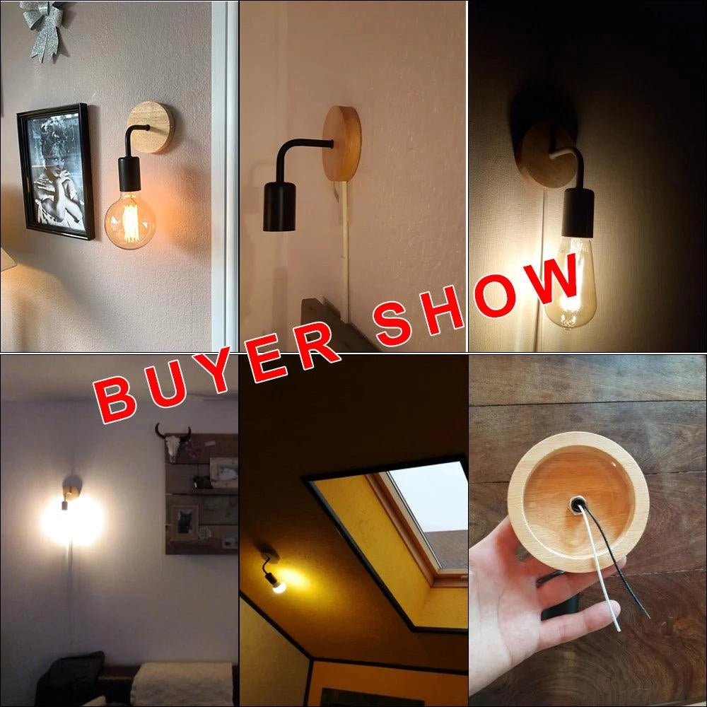 Vintage industrial wall light with a wooden base and black metal pipe fixture, featuring a warm orange and yellow glow, ideal for enhancing interior design.