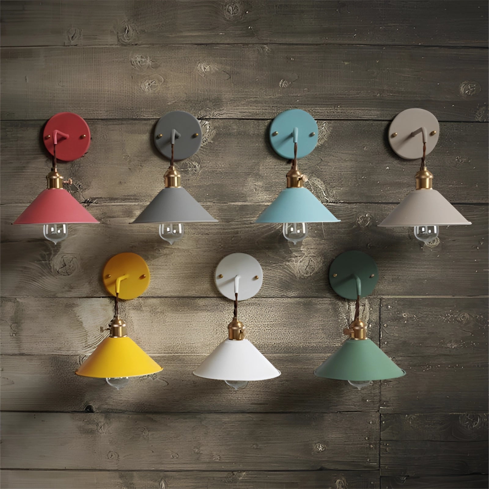 Adjustable brass swing arm sconce wall lamp with a vintage multi-color design featuring ornament-like circular elements and subtle tints and shades, resembling branch-like lines in the structure.