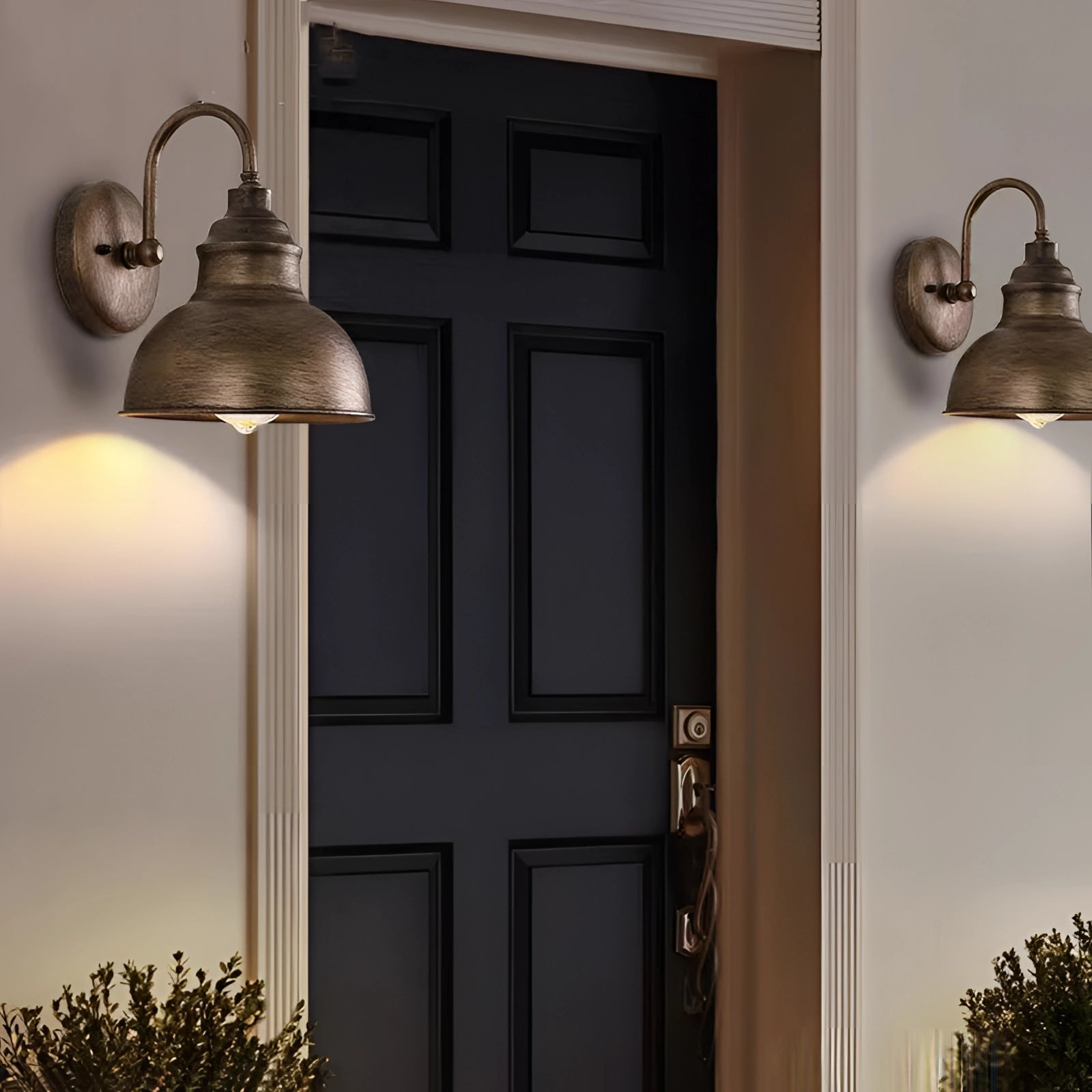 Antique bronze vintage outdoor wall sconce with a weather-resistant design, mounted on a wooden exterior wall near a window, featuring a classic lampshade style suitable for enhancing property lighting and complementing both interior and exterior design elements.