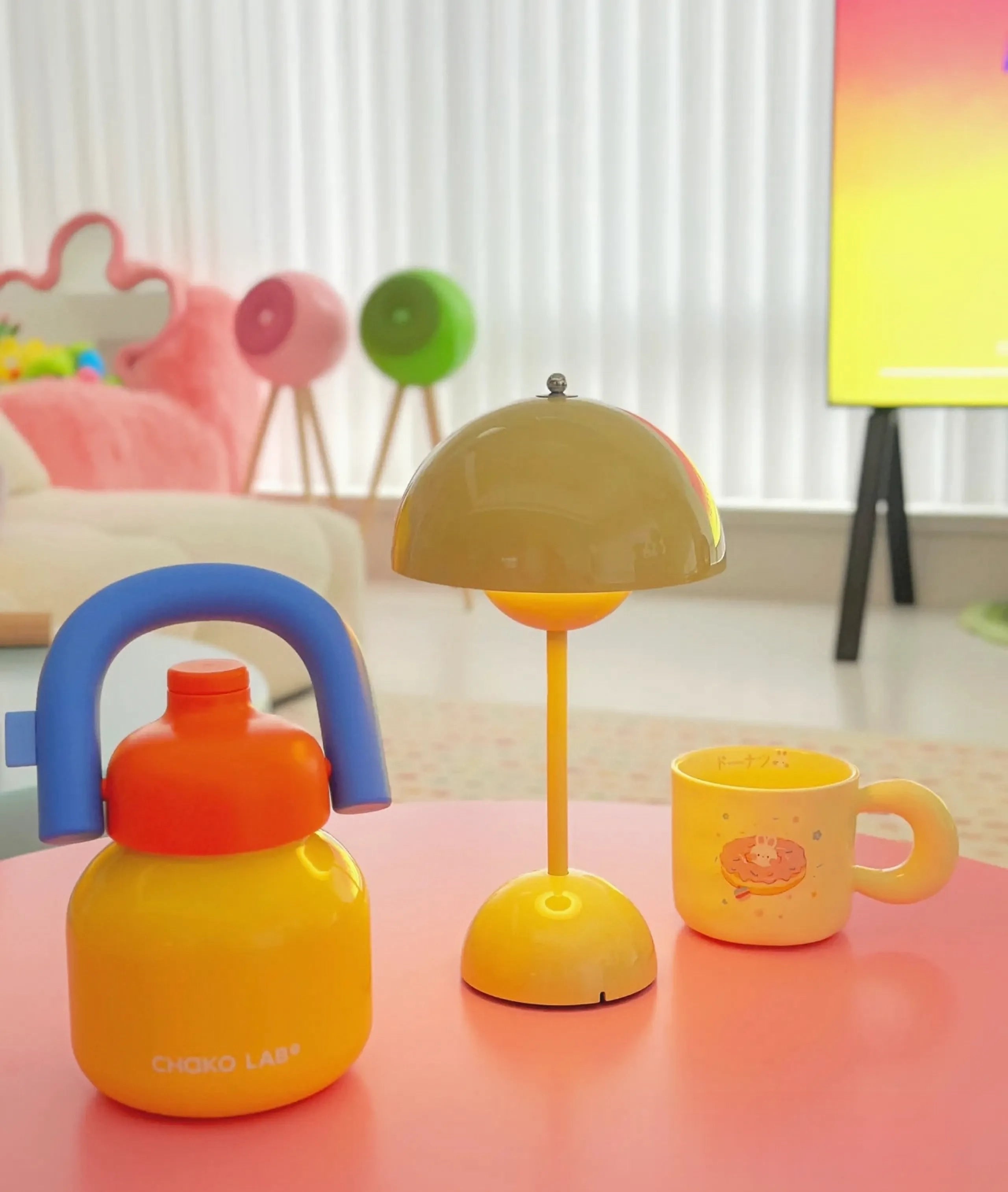 Mustard yellow vintage desk lamp with a retro wooden base placed on a table in a room setting.