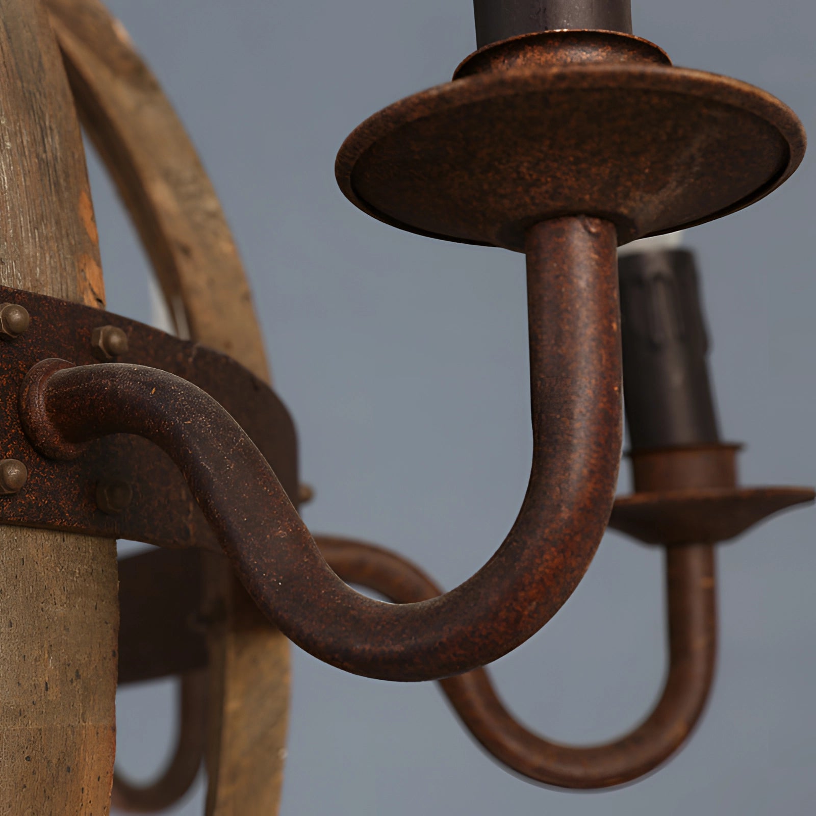 Vintage rustic pendant light featuring a farmhouse design with wooden and metal elements, showcasing an antique finish in shades of brown, bronze, and copper.
