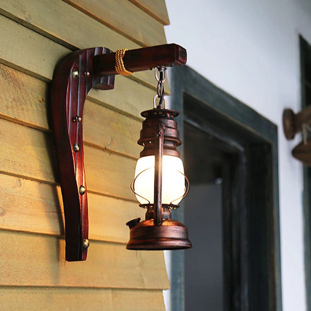 Vintage rustic wall lantern with amber glass and wooden accents, measuring 15.7 inches, designed as an antique lamp sconce for decorative purposes.