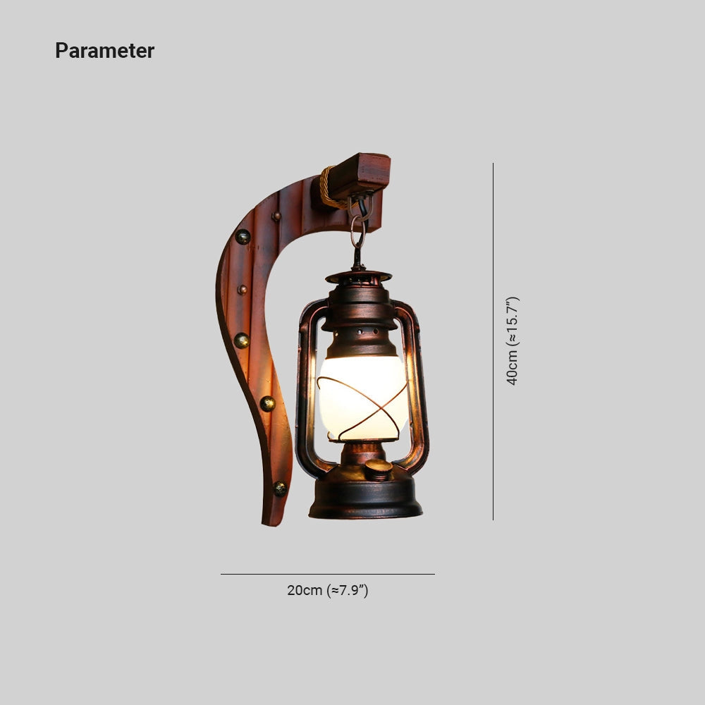 Vintage rustic wall lantern with an antique design, featuring a metal sconce and intricate detailing.