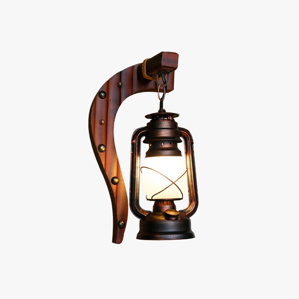 Vintage rustic wall lantern with an antique metal finish, featuring a classic sconce design, ideal for decorative lighting and home decor.