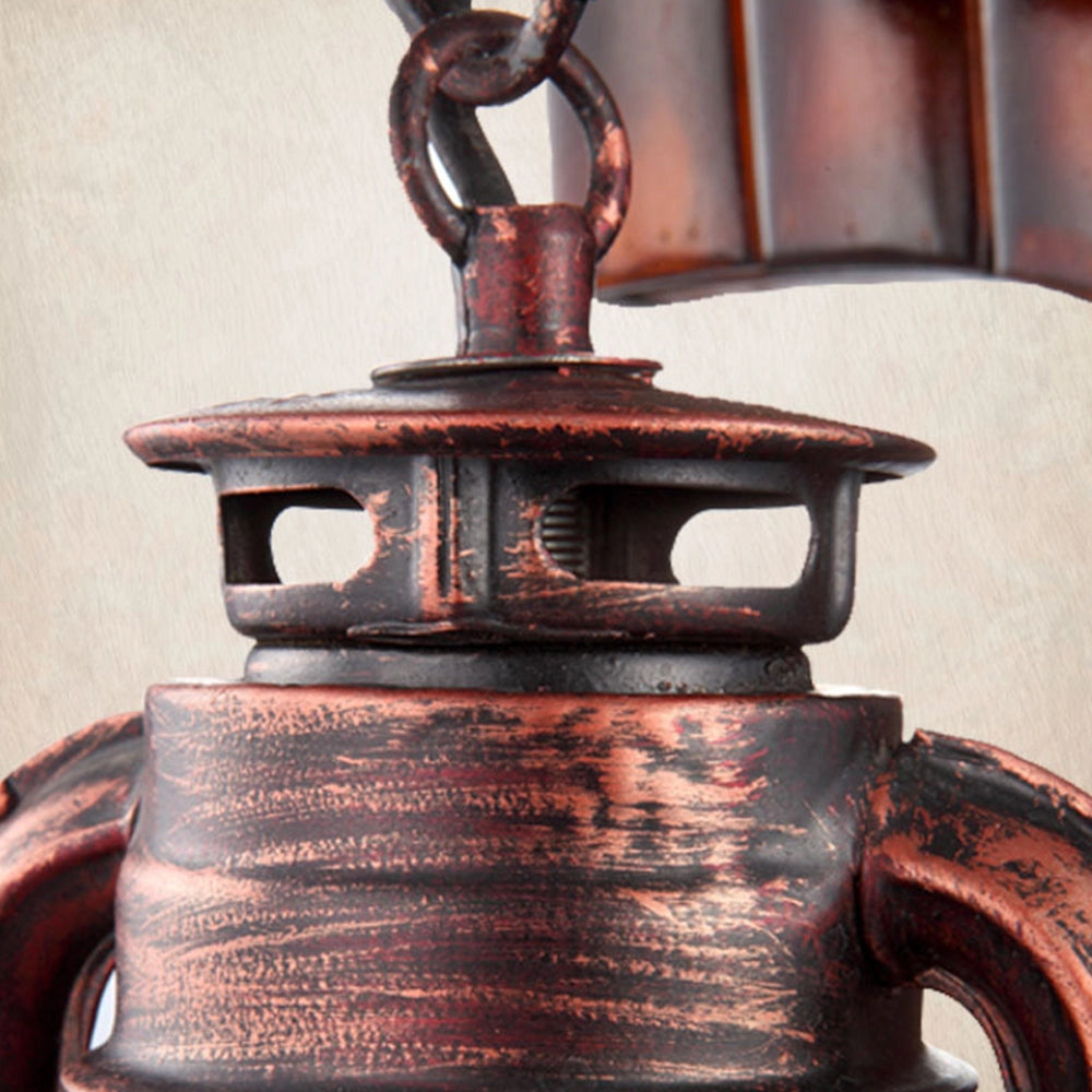 Vintage rustic wall lantern with an antique design, featuring a distressed metal finish and wooden elements, evoking a nostalgic and classic ambiance.