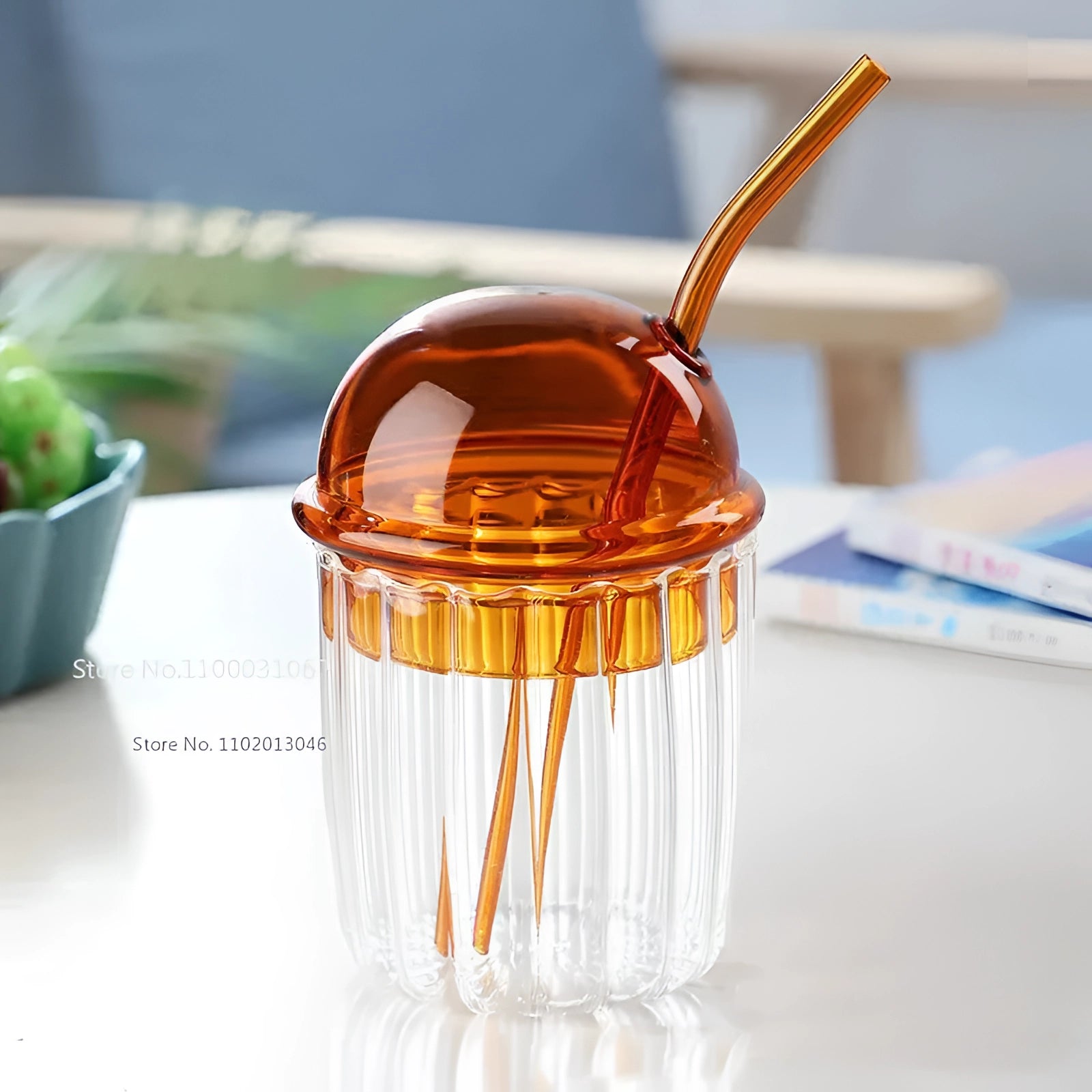 
A vintage-style green glass cup with a lid and straw, eco-friendly design, suitable for containing beverages.
