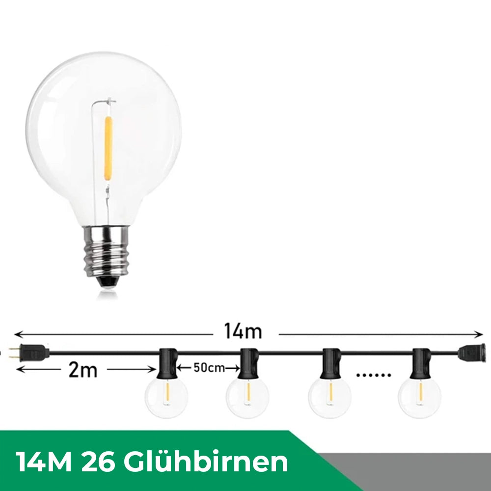 Outdoor patio with weatherproof LED filament string lights featuring 50 lamps, spanning 14 meters. The bulbs are illuminated, creating a warm and inviting atmosphere ideal for outdoor gatherings.