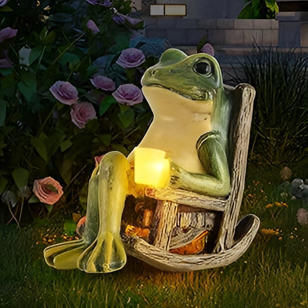 Whimsical green resin frog candle holder placed on grass, perfect for unique patio and indoor décor.