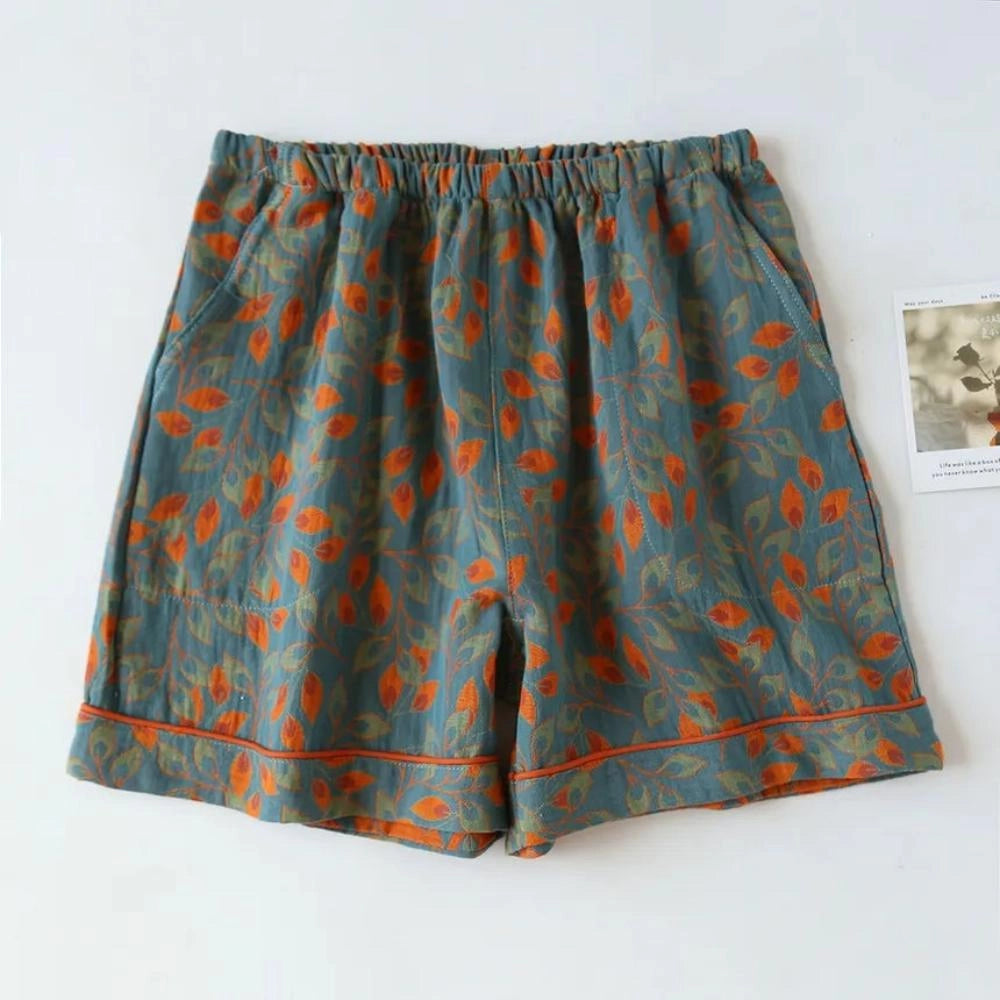 Women's blue floral print lightweight casual shorts with an elastic waistband in size XL.