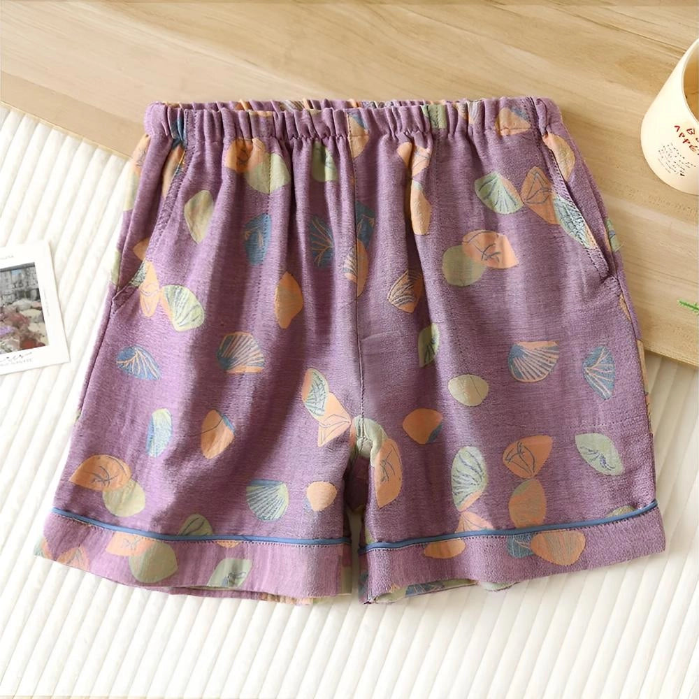 Women's purple leaf print summer shorts in size XL, featuring an elastic waistband and colorful, breathable fabric with a creative pattern.