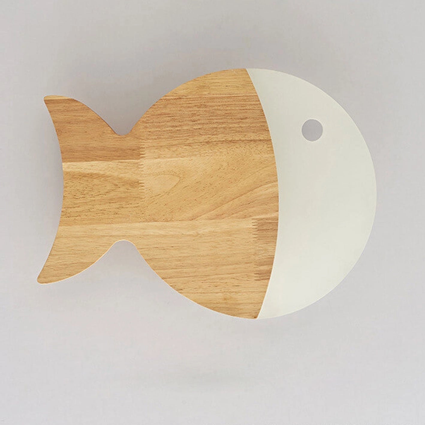 Wooden Fish LED Wall Light featuring an eco-friendly and nautical design with Scandinavian influences, showcasing artistic wood and metal elements in a circular form.