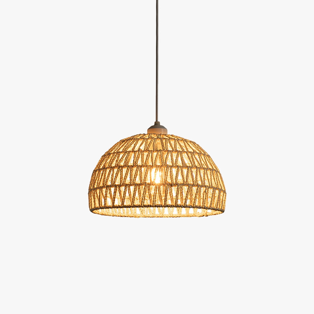 Handcrafted eco-friendly woven bamboo pendant light with a beige lampshade, hanging from the ceiling, illuminating the space with a boho-chic aesthetic.
