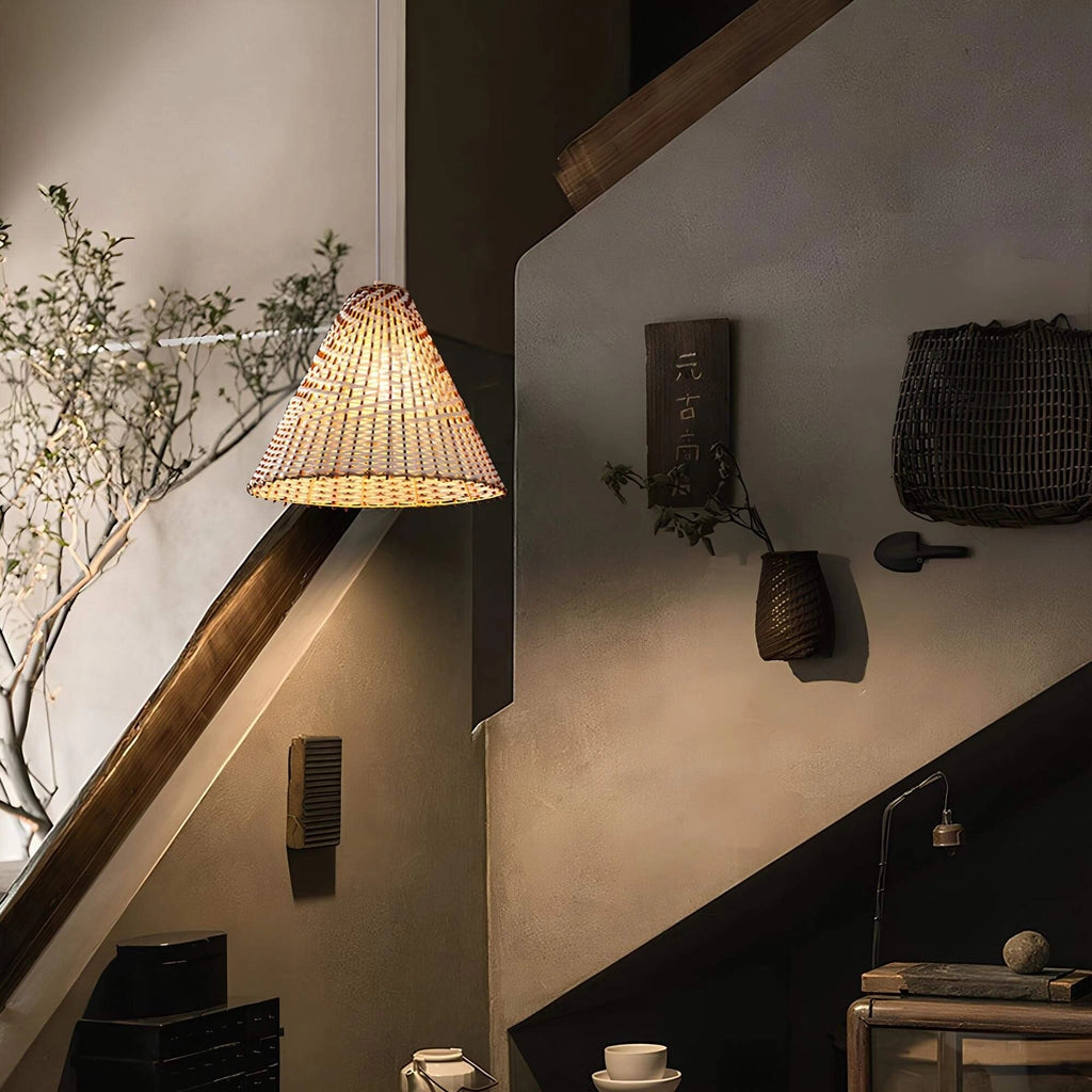 Woven pendant light made from eco-friendly materials, hanging in a contemporary interior setting, showcasing its artistic design with wooden accents and soft lighting.