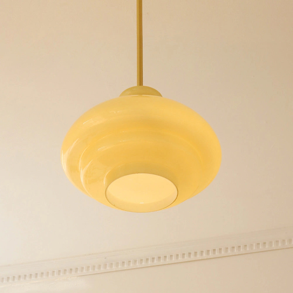 Modern Scandinavian minimalist yellow pendant light with a wooden accent, circular lampshade, and symmetrical ceiling fixture design.