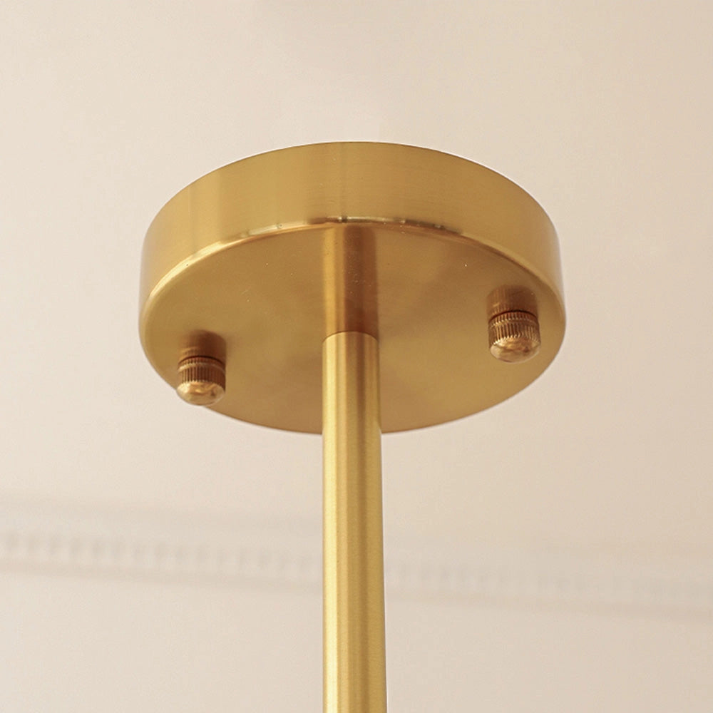Modern Scandinavian minimalist yellow pendant light with a cylindrical shade, featuring wooden and metal elements, hanging from the ceiling.