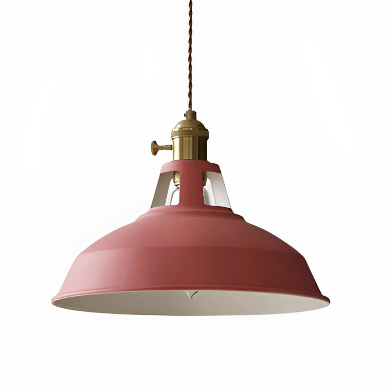 Pink dome-shaped pendant light fixture with brass accents, featuring a vintage industrial design.