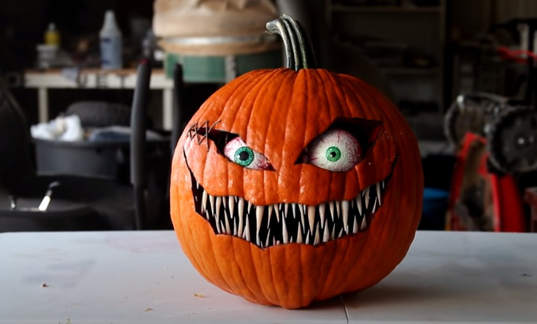 Spooky Halloween Pumpkin Decoration with Rotating Eyeballs