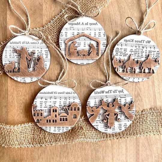 Collection of Ornaments Featuring Nativity Music Sheets